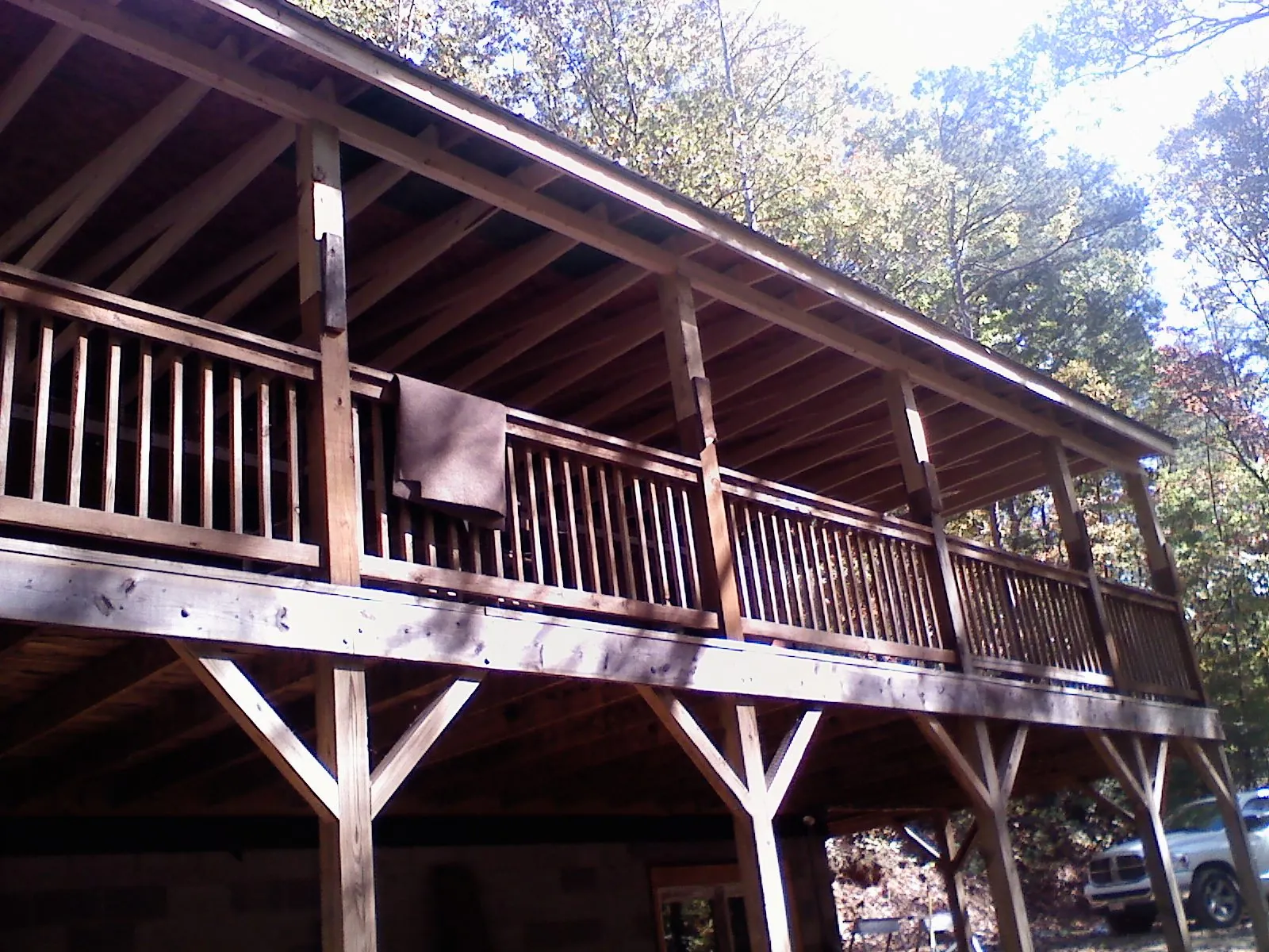 Timber framing under a new elevated porch and deck — Roof Leak Repair in Willseyville by Roofing Brothers
